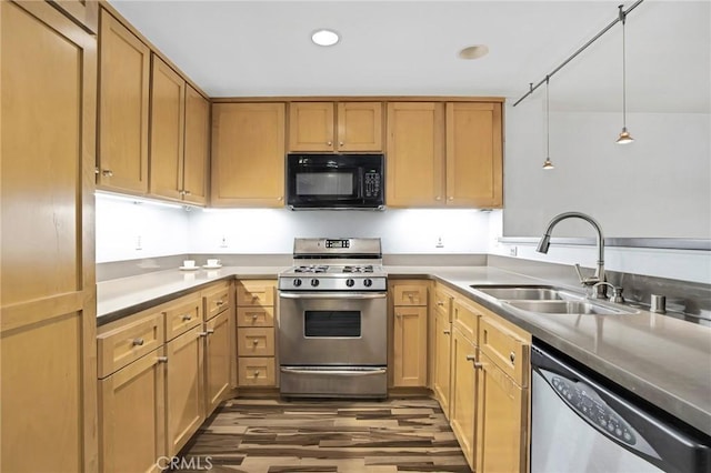 4600 Don Lorenzo Dr Unit 20, Los Angeles, CA 90008 - kitchen with appliances with stainless steel finishes, dark wood finished floors, recessed lighting, pendant lighting, and light countertops