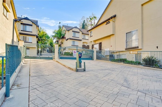 4600 Don Lorenzo Dr Unit 20, Los Angeles, CA 90008 - view of property's community featuring a gate and a residential view