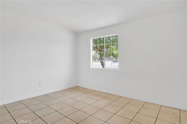 5327 N Rockvale Ave, Azusa, CA 91702 - spare room with light tile patterned floors and baseboards