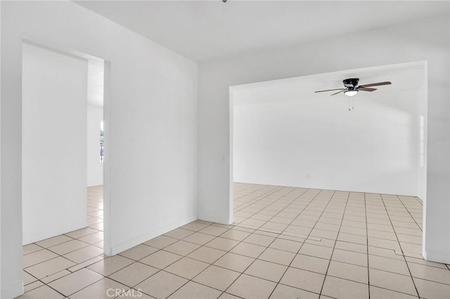 5327 N Rockvale Ave, Azusa, CA 91702 - empty room with a ceiling fan and light tile patterned floors