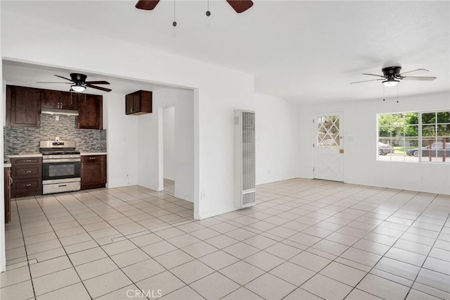 5327 N Rockvale Ave, Azusa, CA 91702 - unfurnished living room with a ceiling fan, a heating unit, and light tile patterned floors