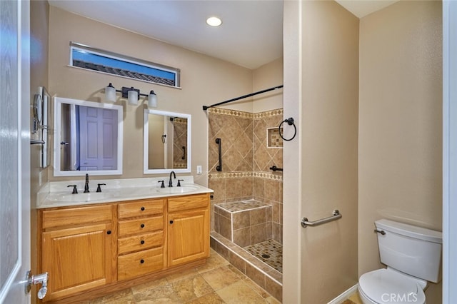 1660 Snowberry Rd, Beaumont, CA 92223 - bathroom featuring a tile shower, double vanity, and recessed lighting