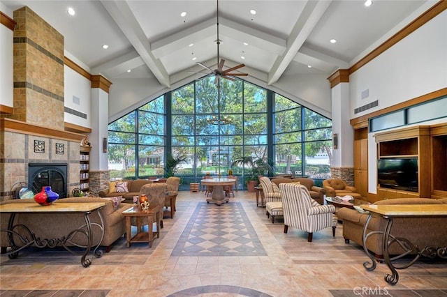 1660 Snowberry Rd, Beaumont, CA 92223 - living room featuring high vaulted ceiling, a ceiling fan, beam ceiling, a tile fireplace, and recessed lighting