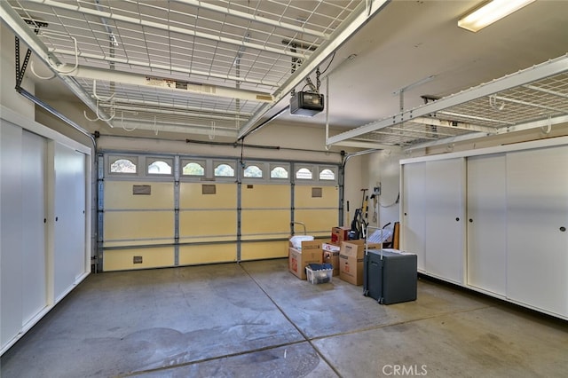 1660 Snowberry Rd, Beaumont, CA 92223 - garage with a garage door opener