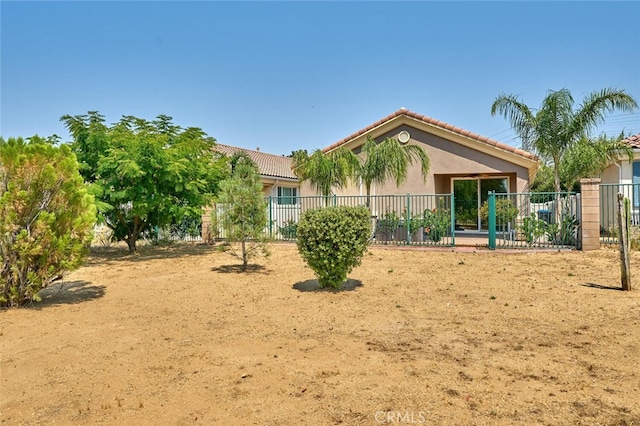 1660 Snowberry Rd, Beaumont, CA 92223 - view of front of house with a tile roof and stucco siding