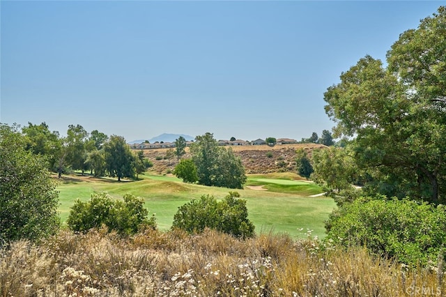 1660 Snowberry Rd, Beaumont, CA 92223 - surrounding community featuring golf course view, a yard, and a mountain view