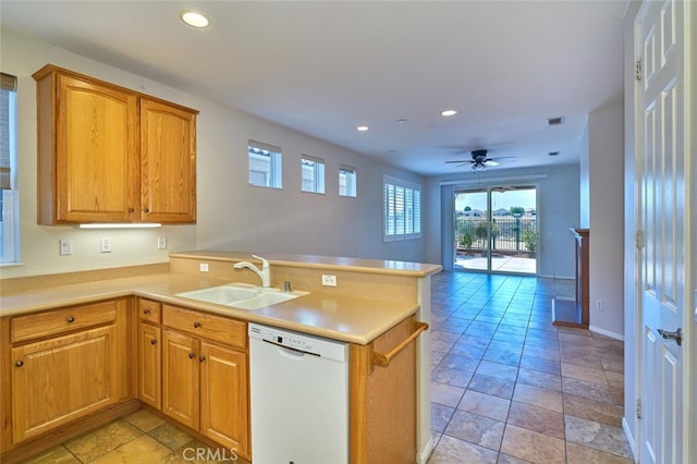 1660 Snowberry Rd, Beaumont, CA 92223 - kitchen with dishwasher, a peninsula, recessed lighting, light countertops, and stone tile floors