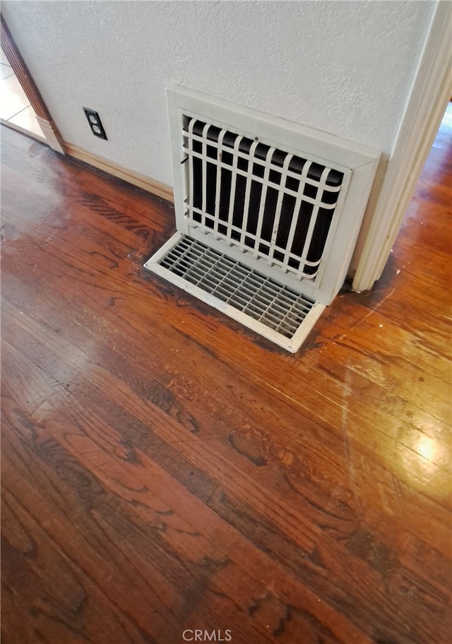 1605 S Birch St, Santa Ana, CA 92707 - detailed view of wood finished floors and heating unit