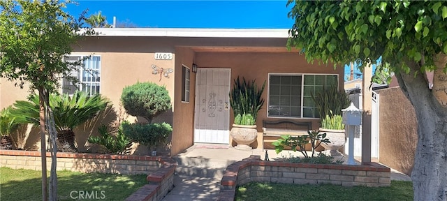 1605 S Birch St, Santa Ana, CA 92707 - entrance to property featuring stucco siding
