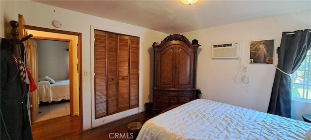 1605 S Birch St, Santa Ana, CA 92707 - bedroom with dark wood-type flooring, a closet, and a wall unit AC