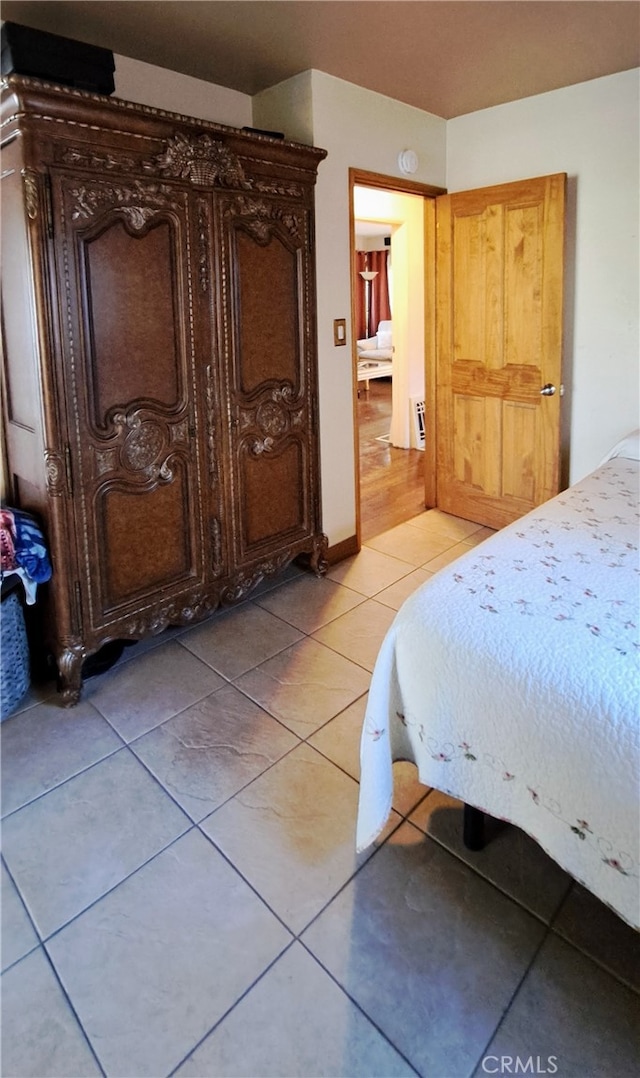 1605 S Birch St, Santa Ana, CA 92707 - bedroom featuring light tile patterned floors