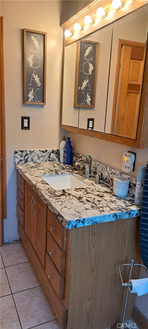 1605 S Birch St, Santa Ana, CA 92707 - bathroom featuring vanity and tile patterned floors