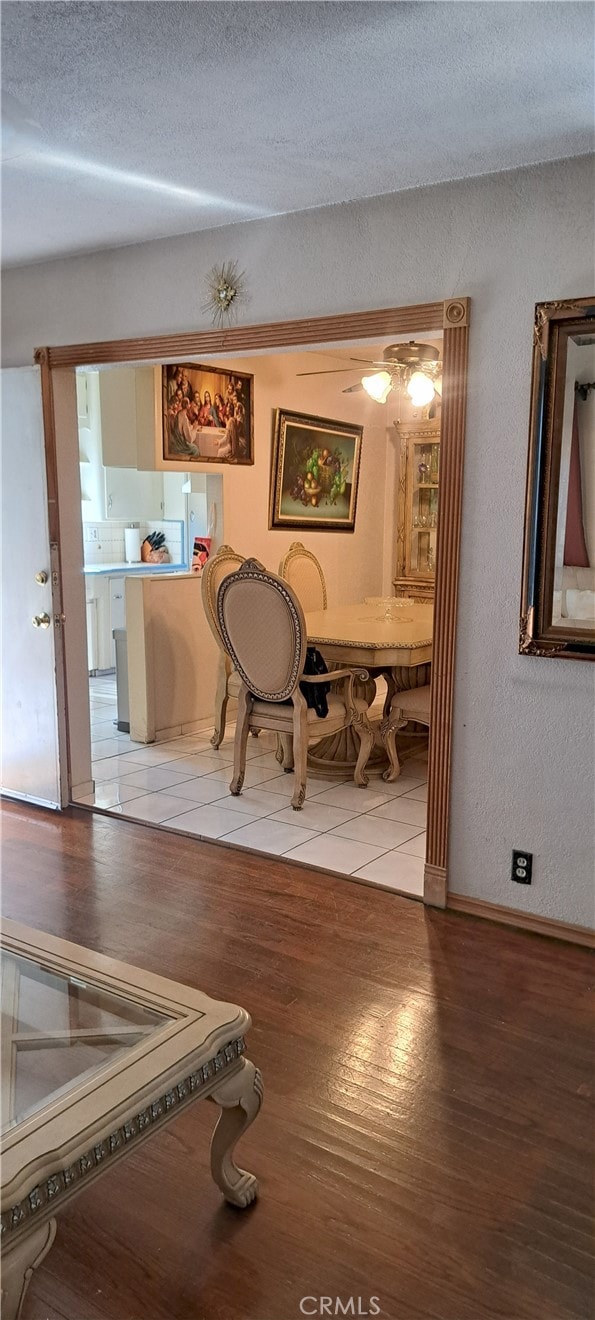 1605 S Birch St, Santa Ana, CA 92707 - corridor with light wood-type flooring and a textured ceiling