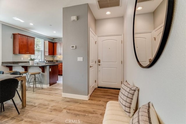 3591 Sacramento Dr Unit 208, San Luis Obispo, CA 93401 - entryway with light wood-type flooring and recessed lighting