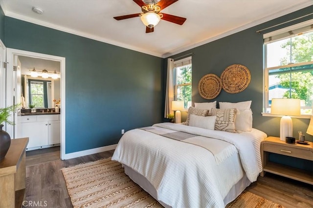 3591 Sacramento Dr Unit 208, San Luis Obispo, CA 93401 - bedroom featuring ornamental molding, multiple windows, wood finished floors, connected bathroom, and ceiling fan