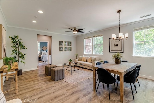 3591 Sacramento Dr Unit 208, San Luis Obispo, CA 93401 - dining area featuring crown molding, light wood-type flooring, a chandelier, recessed lighting, and ceiling fan