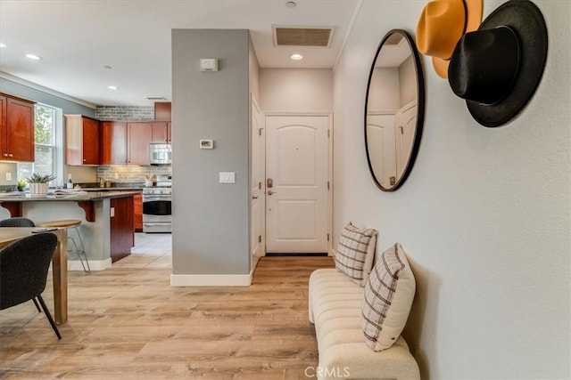 3591 Sacramento Dr Unit 208, San Luis Obispo, CA 93401 - foyer entrance featuring light wood finished floors and recessed lighting