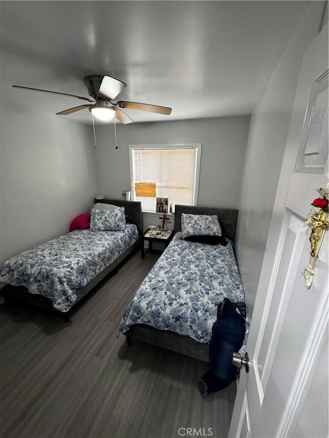 8648 Chestnut Ave, South Gate, CA 90280 - bedroom with wood finished floors and a ceiling fan