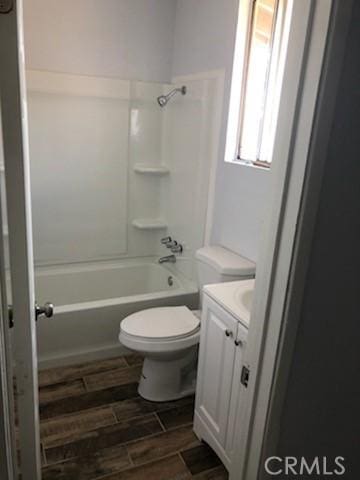 19170 US Highway 18, Apple Valley, CA 92307 - bathroom featuring vanity, shower / tub combination, and wood finish floors