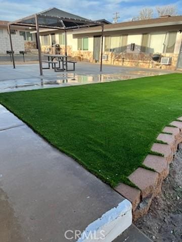 19170 US Highway 18, Apple Valley, CA 92307 - view of green lawn featuring a patio