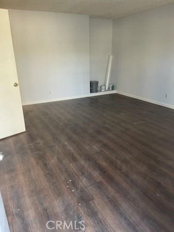 19170 US Highway 18, Apple Valley, CA 92307 - spare room featuring dark wood-style flooring and baseboards