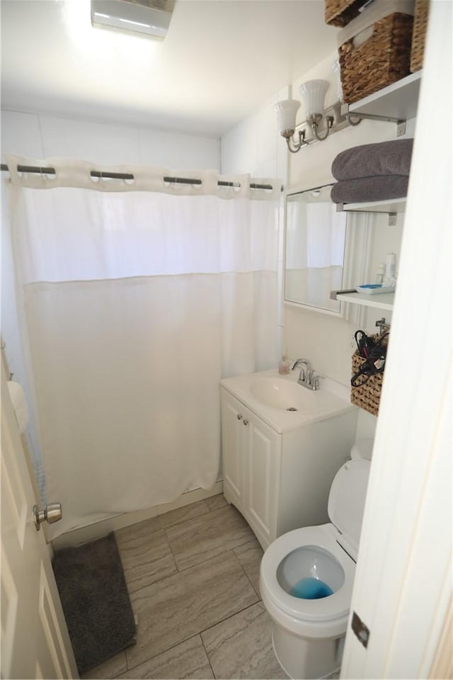 2432 N Eastern Ave, Los Angeles, CA 90032 - bathroom featuring vanity and shower / bath combo with shower curtain