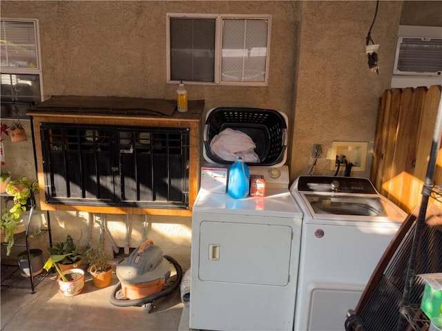 2432 N Eastern Ave, Los Angeles, CA 90032 - laundry area with washing machine and dryer and a wall mounted air conditioner