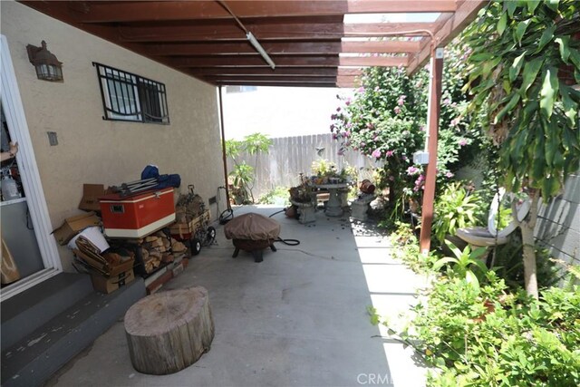 2432 N Eastern Ave, Los Angeles, CA 90032 - view of patio / terrace featuring an outdoor fire pit and a pergola