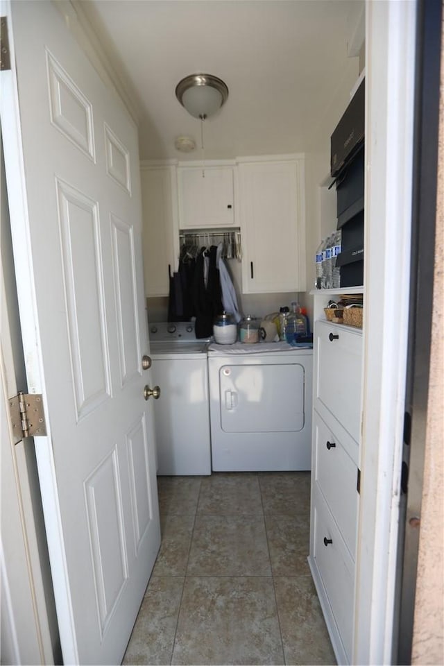 2432 N Eastern Ave, Los Angeles, CA 90032 - laundry area with cabinet space and washing machine and clothes dryer