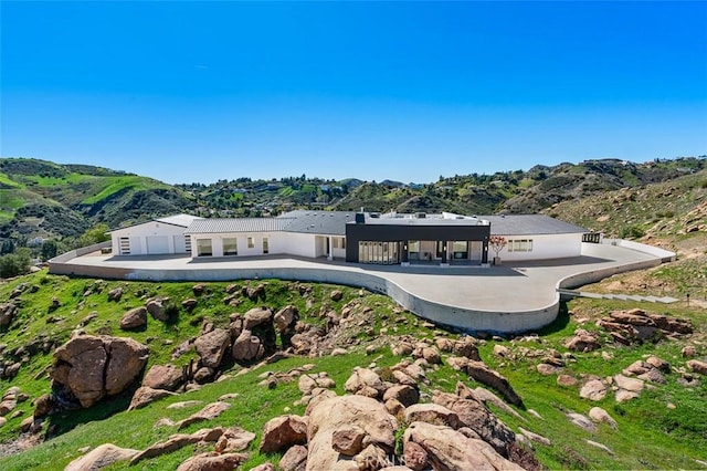 109 Buckskin Rd, Bell Canyon, CA 91307 - rear view of house with a mountain view and a patio