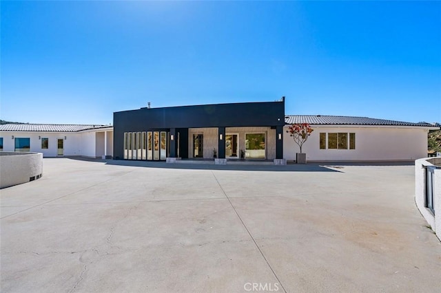 109 Buckskin Rd, Bell Canyon, CA 91307 - back of house featuring stucco siding