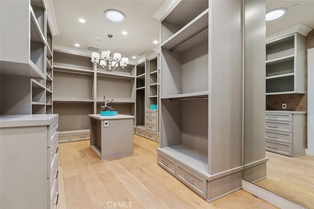 109 Buckskin Rd, Bell Canyon, CA 91307 - walk in closet featuring light wood-style flooring and a chandelier