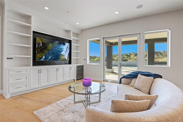 109 Buckskin Rd, Bell Canyon, CA 91307 - living room with beverage cooler, built in features, light wood-style floors, and recessed lighting