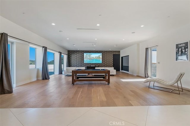 109 Buckskin Rd, Bell Canyon, CA 91307 - living area with light wood finished floors, an accent wall, and recessed lighting