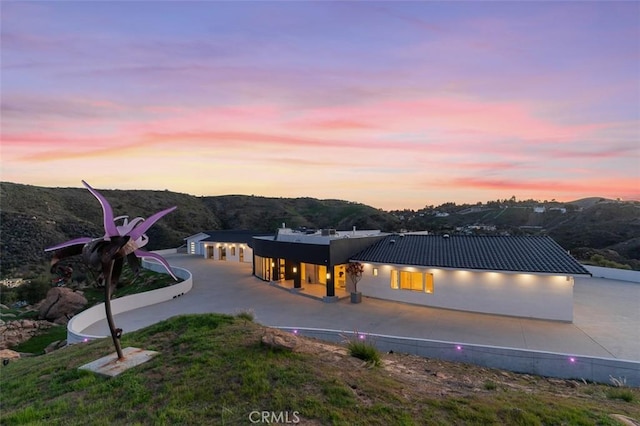 109 Buckskin Rd, Bell Canyon, CA 91307 - view of front facade with a metal roof and a standing seam roof