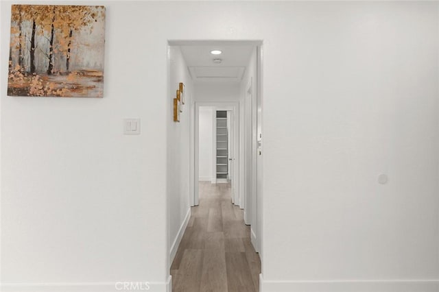 7751 La Mesa Way, Buena Park, CA 90620 - hallway featuring light wood-style floors and baseboards