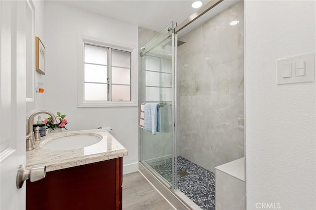 7751 La Mesa Way, Buena Park, CA 90620 - full bath featuring vanity, a shower stall, and wood finished floors