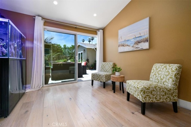 20516 Aetna St, Woodland Hills, CA 91367 - sitting room featuring wood finished floors, lofted ceiling, and recessed lighting