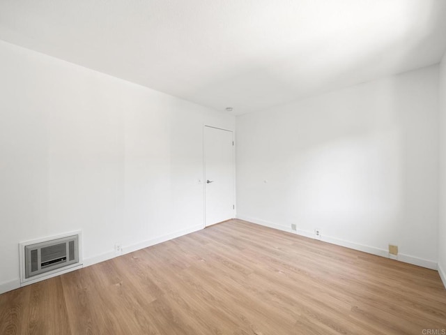 6390 Rancho Mission Rd Unit 202, San Diego, CA 92108 - spare room with light wood finished floors and baseboards