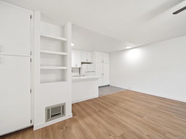 6390 Rancho Mission Rd Unit 202, San Diego, CA 92108 - unfurnished living room featuring light wood-style floors, a ceiling fan, and recessed lighting