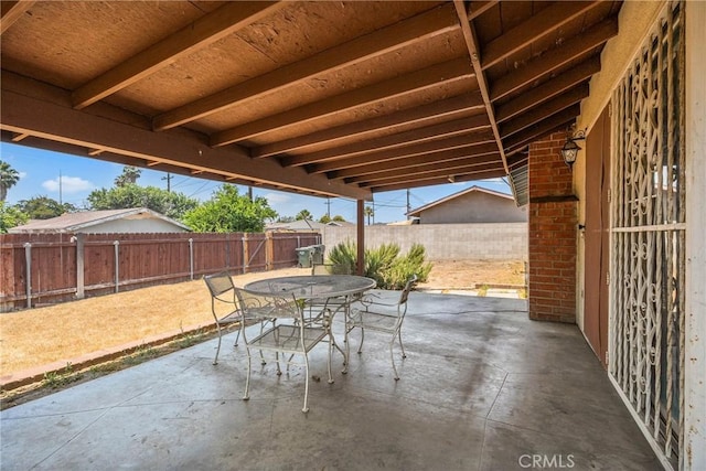 502 Tasman Ave, Pomona, CA 91767 - fenced backyard featuring outdoor dining area and a patio area