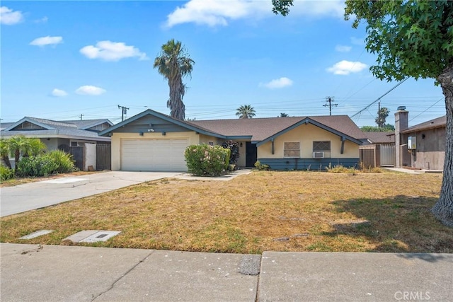 502 Tasman Ave, Pomona, CA 91767 - single story home with concrete driveway, a garage, and stucco siding