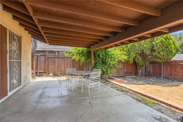 502 Tasman Ave, Pomona, CA 91767 - fenced backyard with a patio area and outdoor dining area