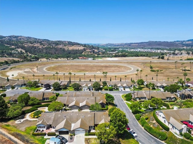 81 Via Larga Vis, Bonsall, CA 92003 - aerial perspective of suburban area with a mountain backdrop