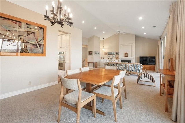 81 Via Larga Vis, Bonsall, CA 92003 - dining room featuring light colored carpet, a chandelier, vaulted ceiling, recessed lighting, and a ceiling fan