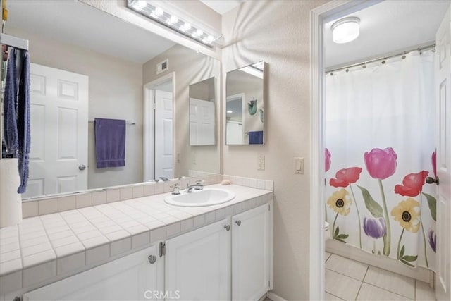 81 Via Larga Vis, Bonsall, CA 92003 - full bathroom with vanity, tile patterned flooring, and curtained shower