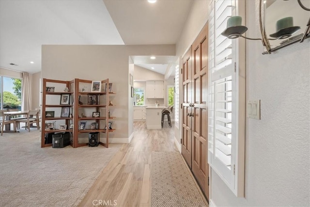 81 Via Larga Vis, Bonsall, CA 92003 - hall with light wood-type flooring, recessed lighting, and vaulted ceiling