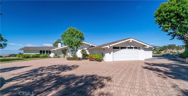 13 Buggy Whip Dr, Rolling Hills, CA 90274 - ranch-style house with decorative driveway and a garage