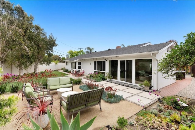 2008 N Capella Ct, Costa Mesa, CA 92626 - rear view of house featuring a fenced backyard, a patio, an outdoor living space, and a chimney
