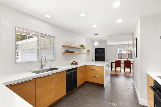 2008 N Capella Ct, Costa Mesa, CA 92626 - kitchen featuring dishwasher, recessed lighting, a peninsula, decorative light fixtures, and light countertops